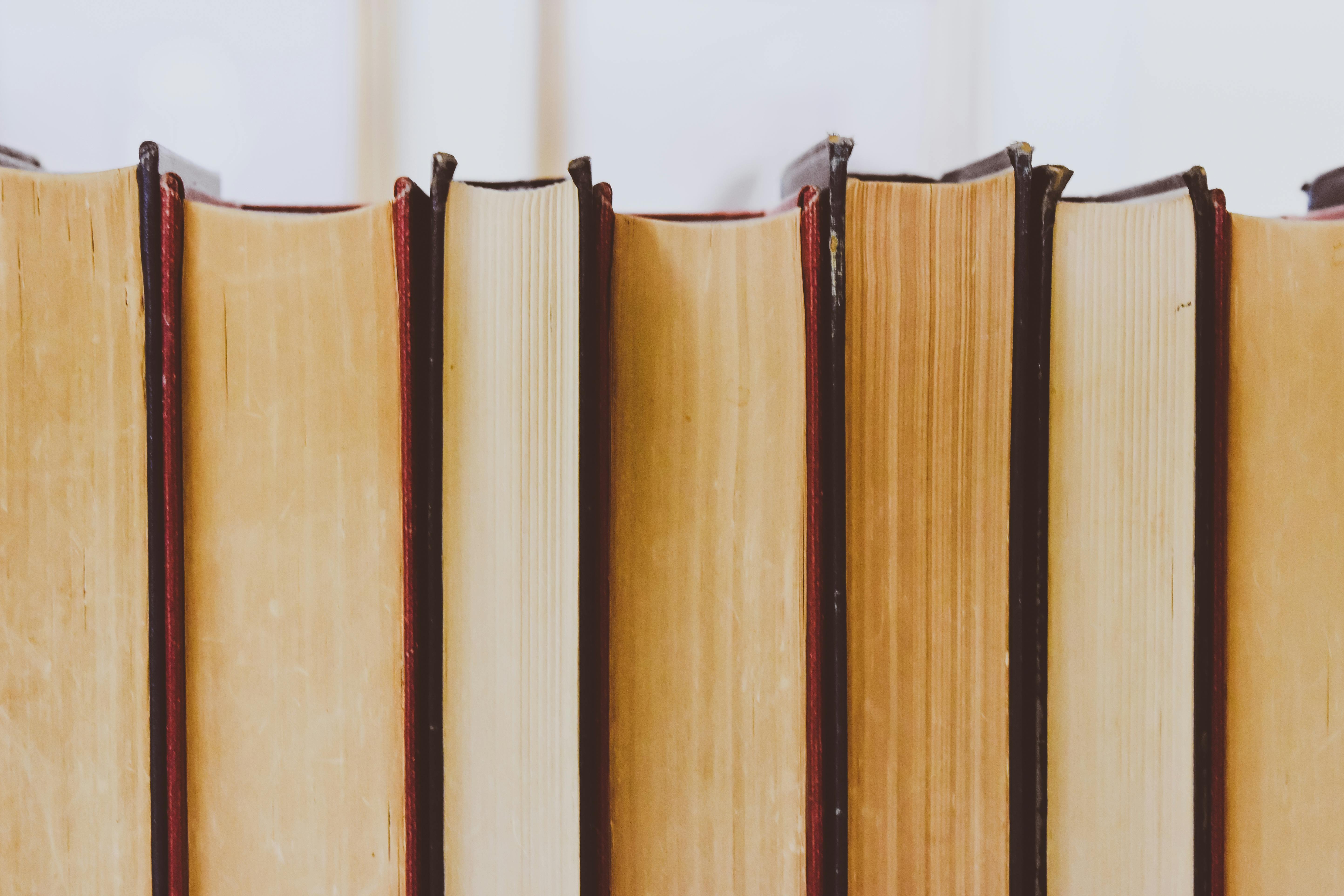 Stack of closed books on a shelf